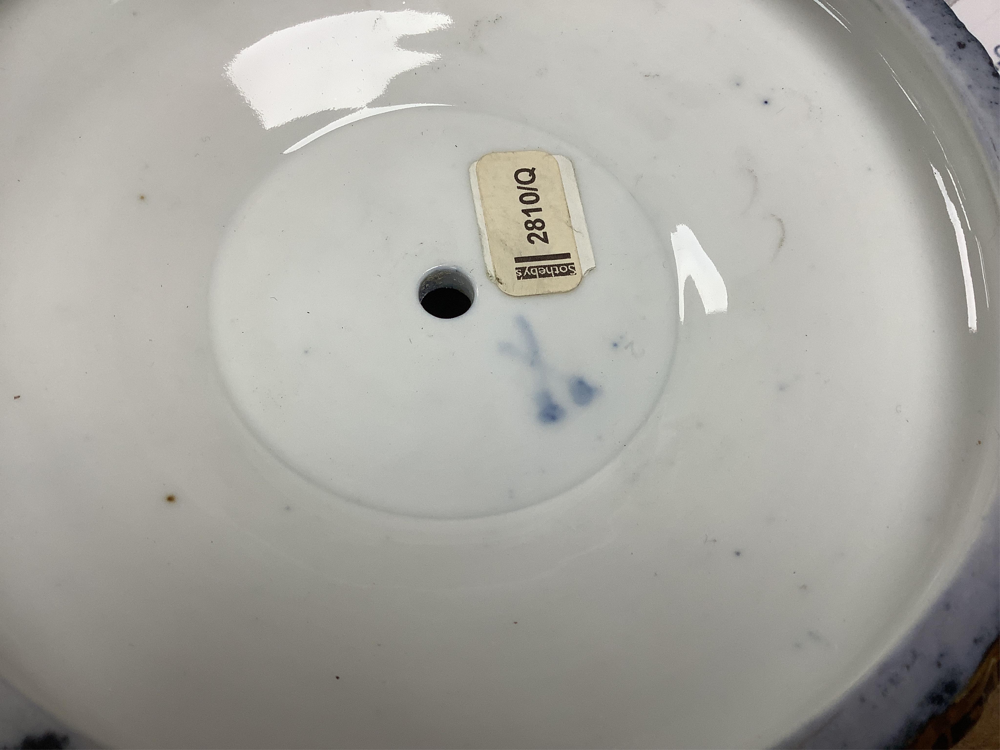 A pair of late 19th century Meissen three tier cake stands with figural tops, 48cm high